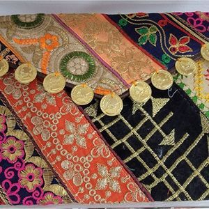 Upcycled vintage fabric clutch